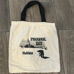 Alaska small canvas bag with black vinyl handle from Prudhoe Bay Alaska.